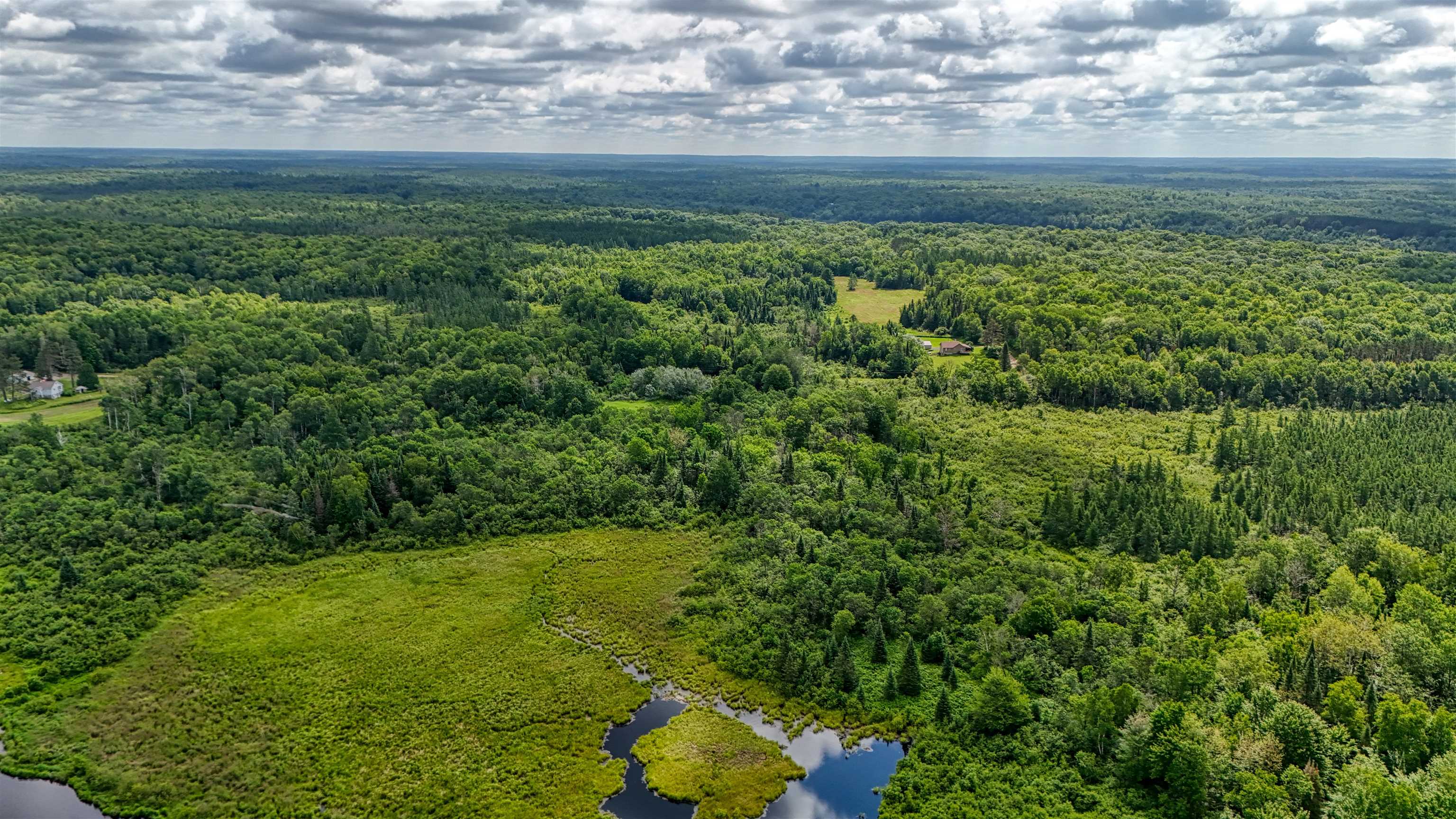 8143 Wright Road Winter, WI 54896 - Photo 24 of 24 Bird's eye view of a large body of water and a forest