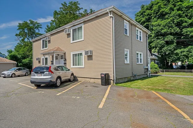 a car parked in front of a house