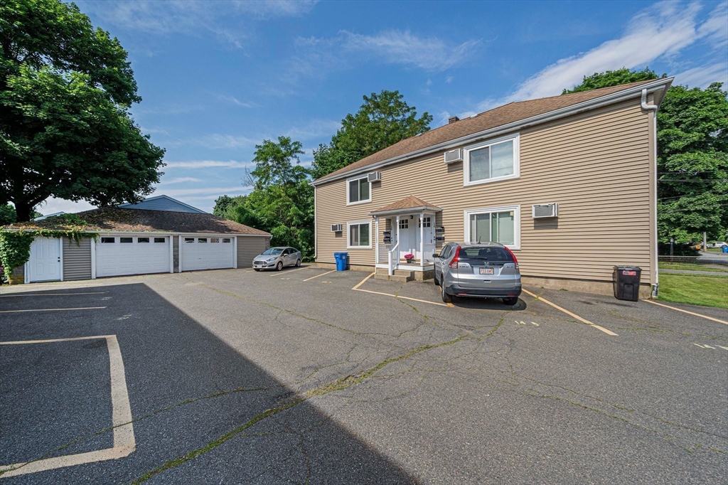 14 Hartwell Street, Unit B Waltham, MA 02453 - Photo 19 of 24 a car parked in front of house