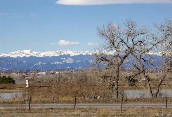 a view of a yard with mountain view