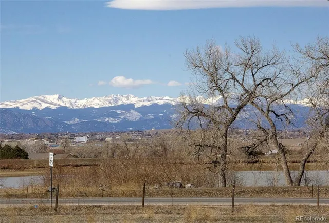 a view of a yard with mountain view