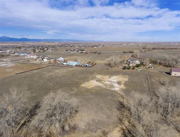 an aerial view of beach and city