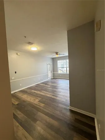 a view of a livingroom with a staircase
