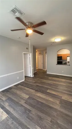 a view of a room with a flat screen tv