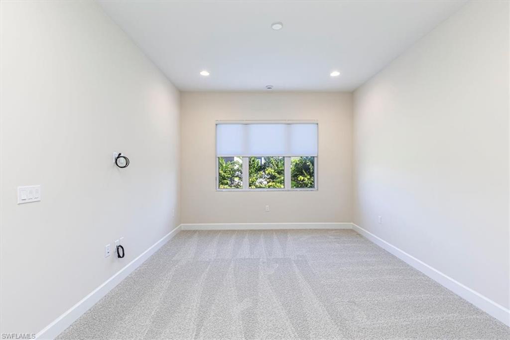 2749 Durham Circle Naples, FL 34112 - Photo 18 of 30 a view of room with window and outdoor space