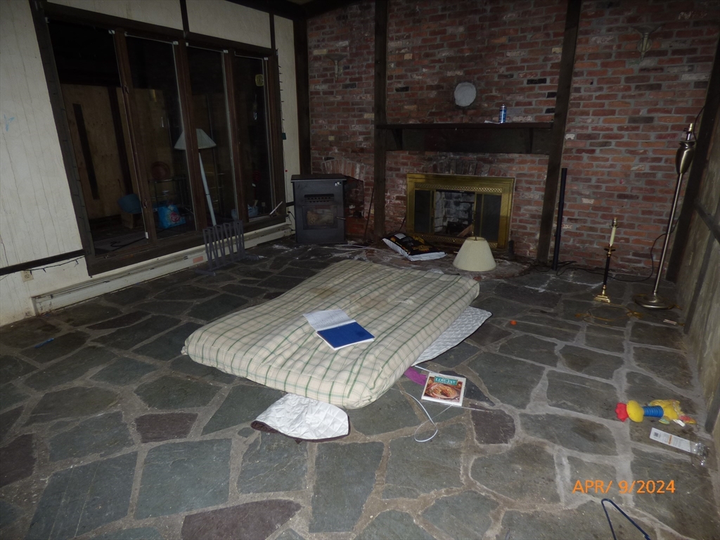 8 Cold Spring Road Southampton, MA 01073 - Photo 11 of 20 a living room with furniture and a fireplace