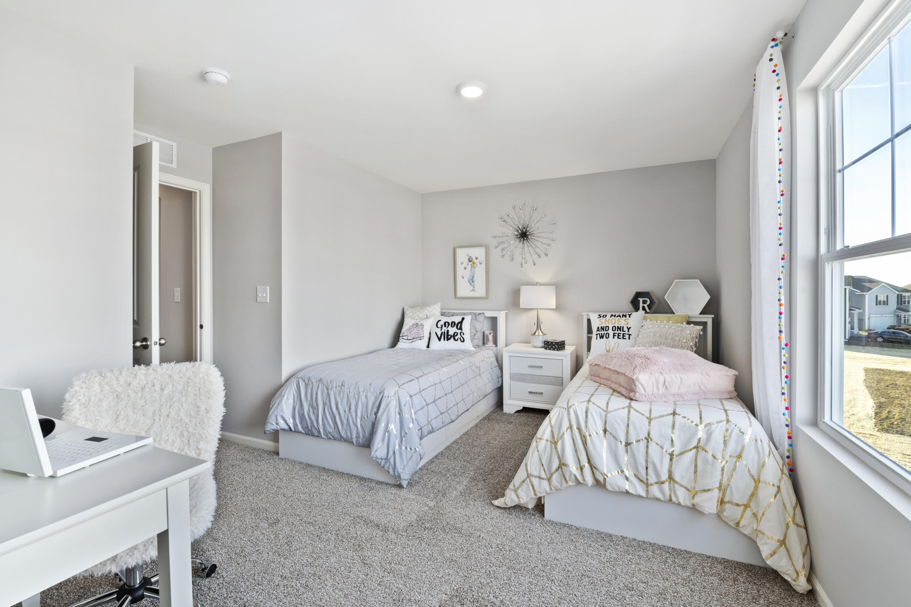 585 Marcella Street Hebron, IN 46341 - Photo 20 of 21 a bedroom with two beds and a window