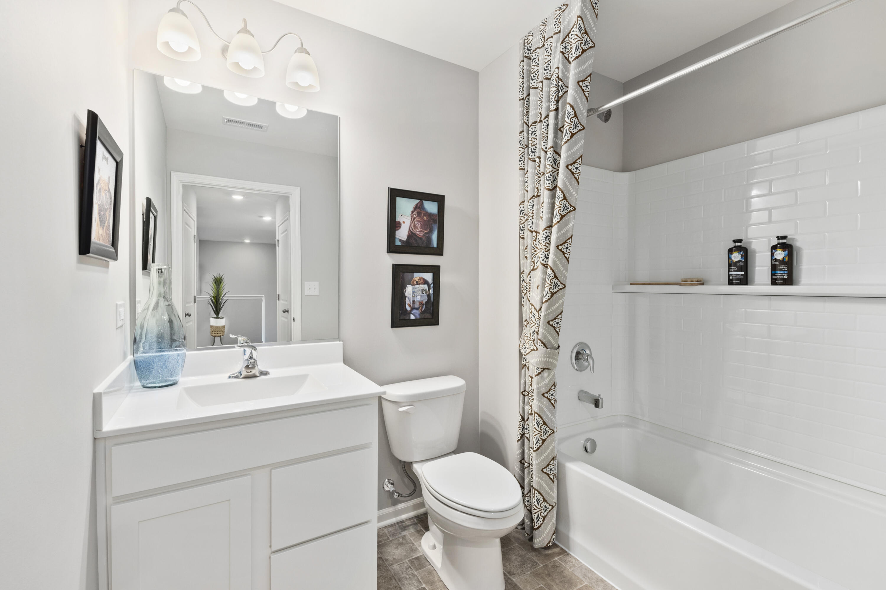 585 Marcella Street Hebron, IN 46341 - Photo 21 of 21 a bathroom with a sink a toilet and shower