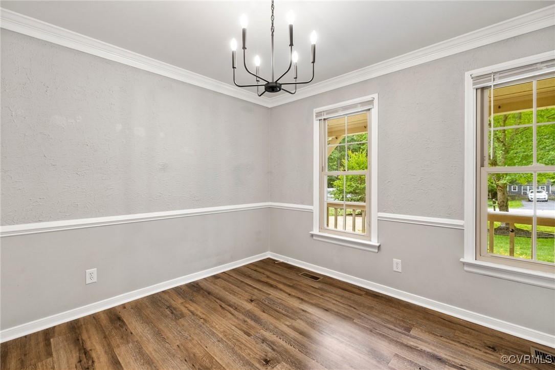 619 Spirea Road North Chesterfield, VA 23236 - Photo 5 of 26 a view of an empty room with windows