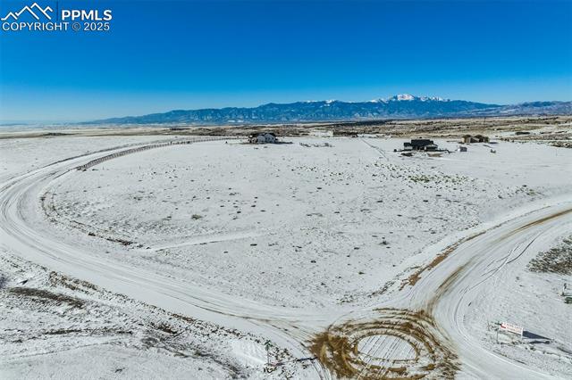 2940 Hoofprint Road Peyton, CO 80831 - Photo 5 of 20 Property view of water featuring a mountain view