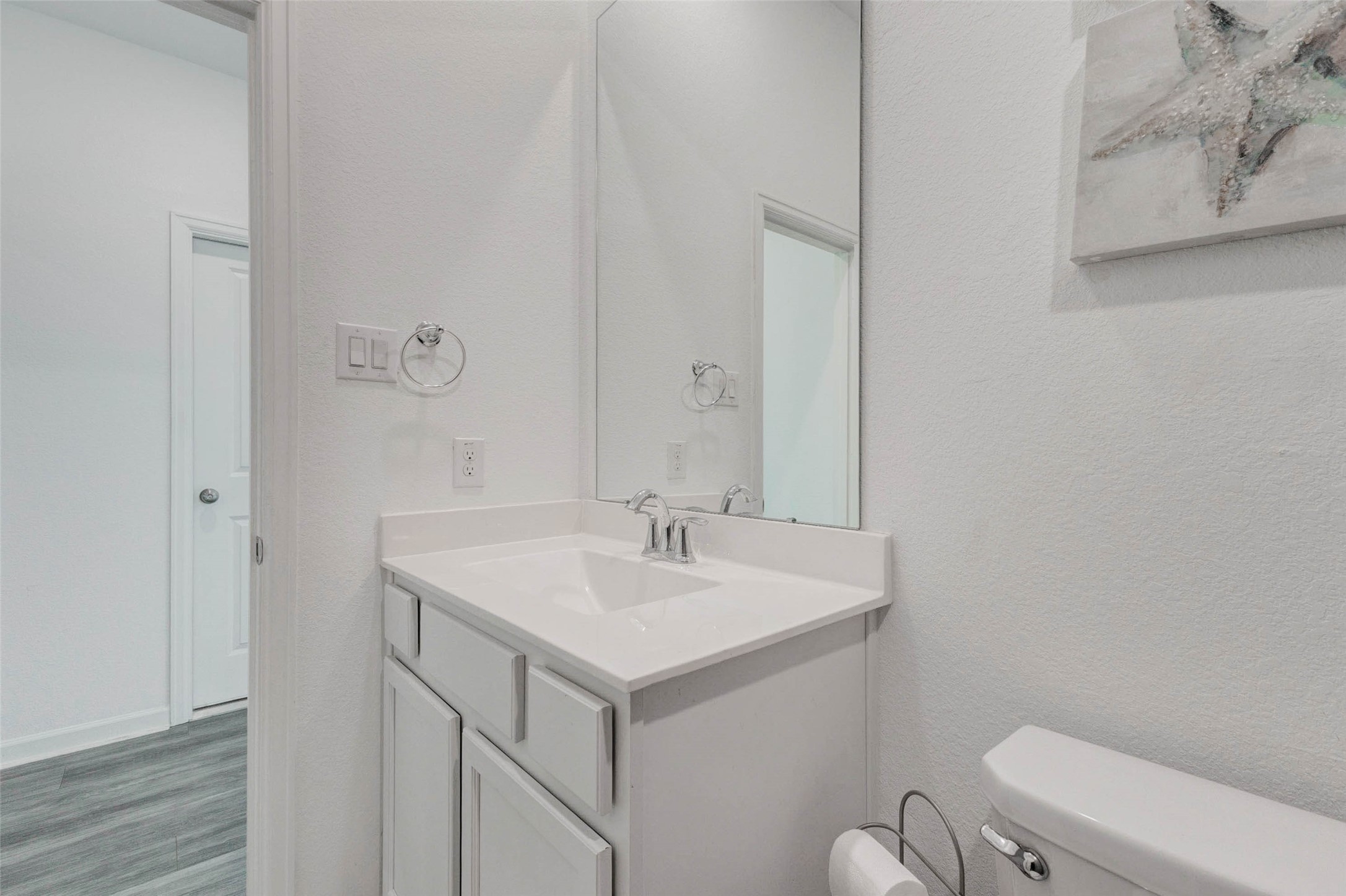 3711 Castle Rock Drive Rosenberg, TX 77469 - Photo 37 of 46 a bathroom with a sink a toilet and a mirror