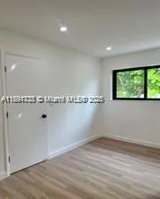 an empty room with a window