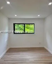 a view of a room with a window