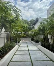 a view of pathway along with yard