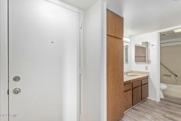 a view of a refrigerator in kitchen