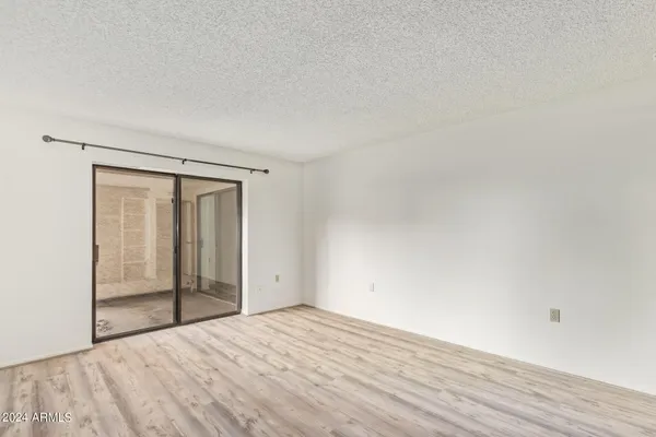 a bathroom with a shower and a tub