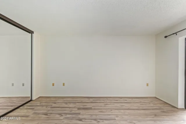 wooden floor and window in a room