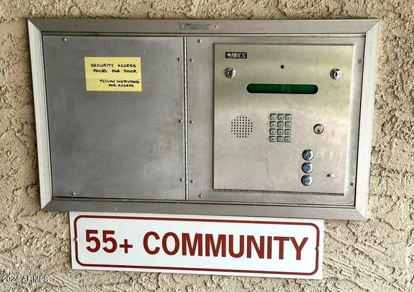 a front view of a building with garden