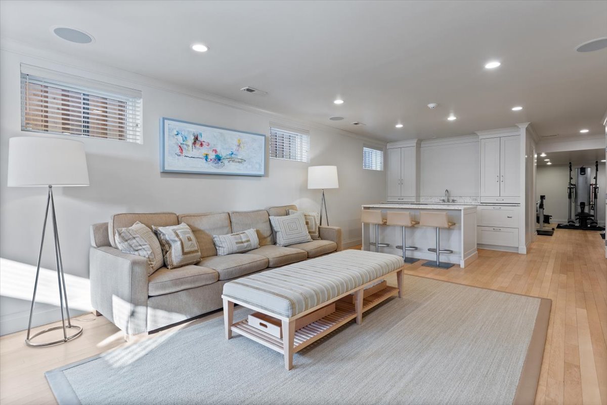 332 West Goethe Street Chicago, IL 60610 - Photo 19 of 29 a spacious bedroom with a bed and a view of kitchen