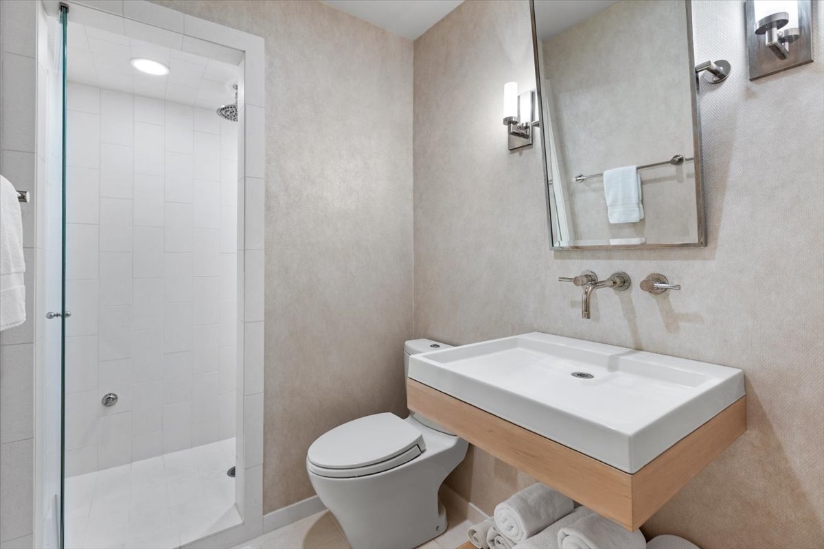 332 West Goethe Street Chicago, IL 60610 - Photo 21 of 29 a white toilet sitting next to a bathroom sink