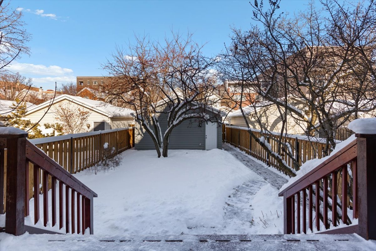 332 West Goethe Street Chicago, IL 60610 - Photo 24 of 29 a view of backyard with deck and wooden fence