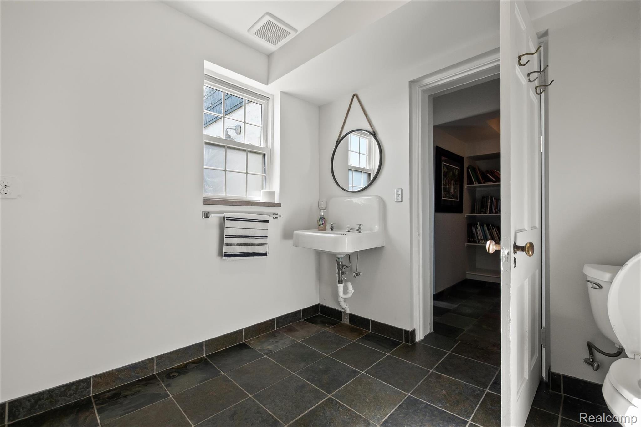 6390 Commerce Road West Bloomfield, MI 48324 - Photo 42 of 74 Basement half bath