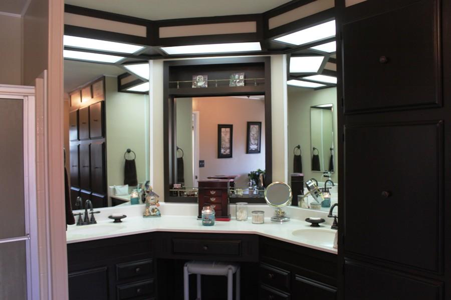 6110 Hubbard Road Acton, CA 93510 - Photo 13 of 46 a bathroom with a sink vanity and a mirror
