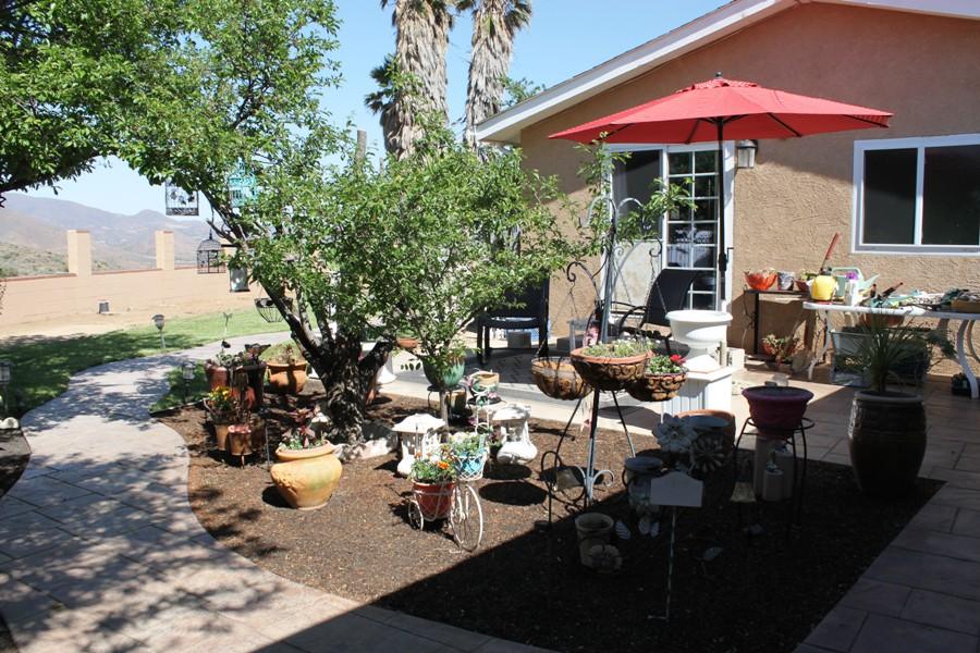 6110 Hubbard Road Acton, CA 93510 - Photo 19 of 46 a view of a chairs and tables in patio