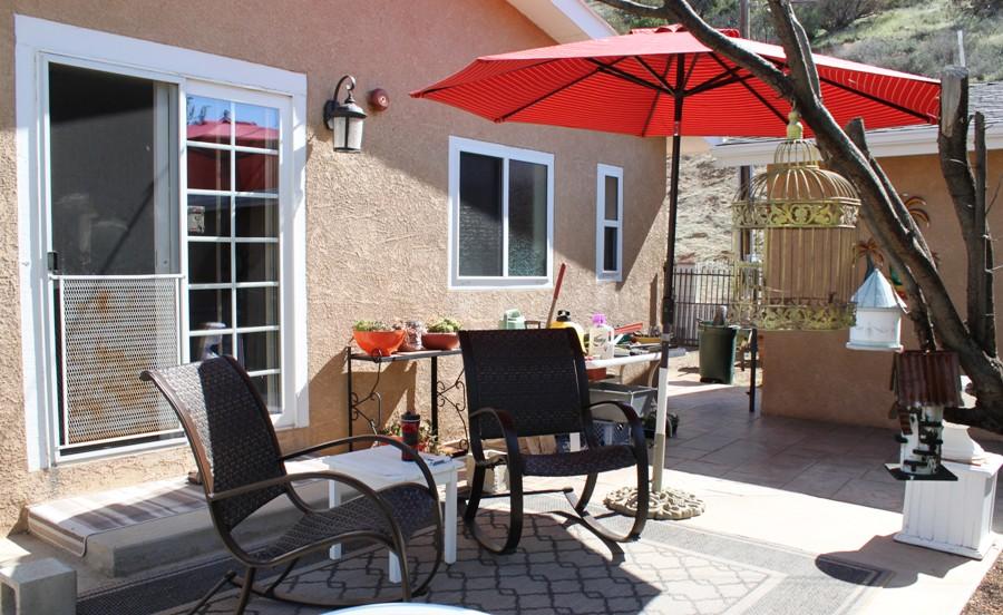 6110 Hubbard Road Acton, CA 93510 - Photo 20 of 46 a view of a dining room with furniture and chandelier