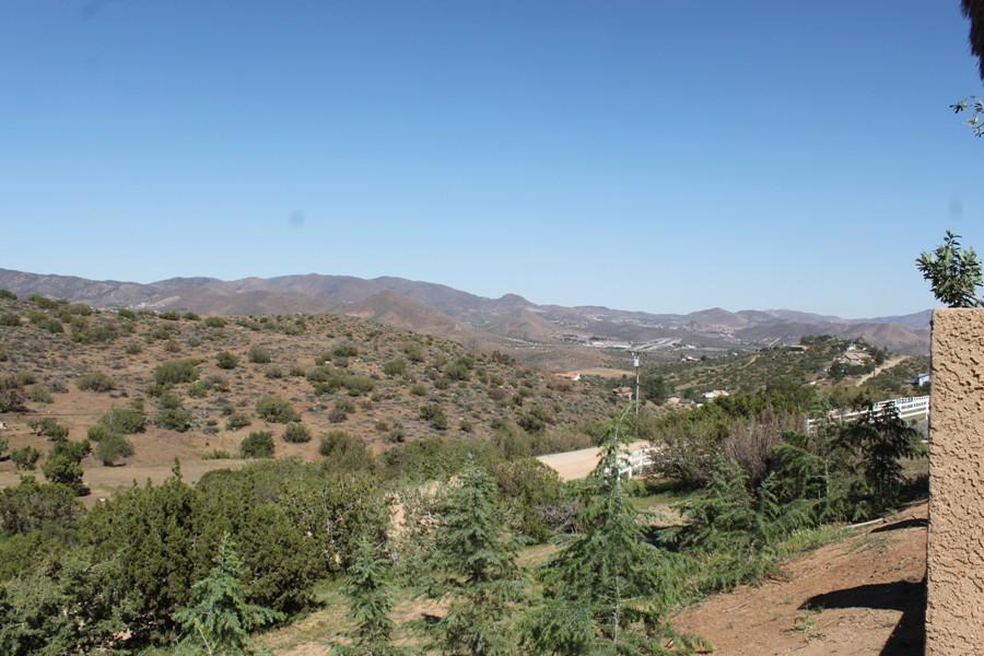 6110 Hubbard Road Acton, CA 93510 - Photo 22 of 46 an aerial view of mountain with trees in the background