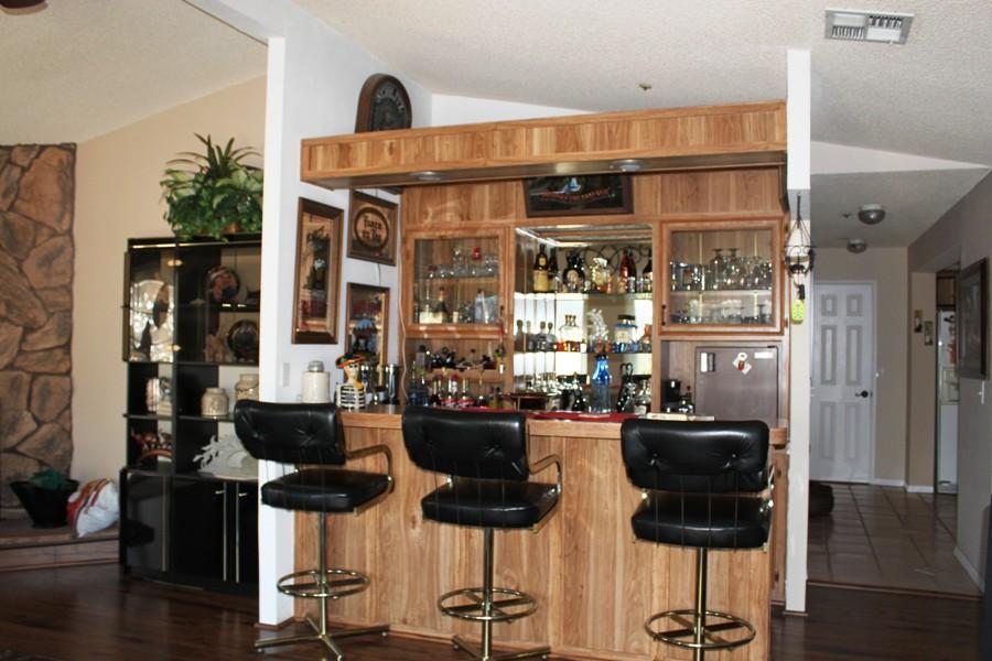 6110 Hubbard Road Acton, CA 93510 - Photo 28 of 46 a dining room with furniture and wooden floor
