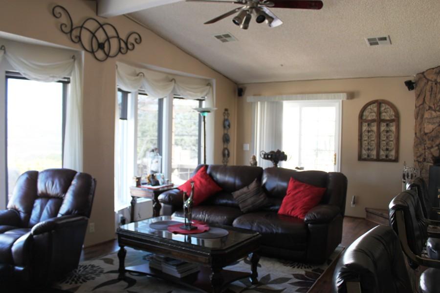 6110 Hubbard Road Acton, CA 93510 - Photo 33 of 46 a living room with furniture and wooden floor