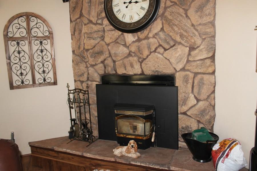 6110 Hubbard Road Acton, CA 93510 - Photo 34 of 46 a room with a fireplace and a mirror