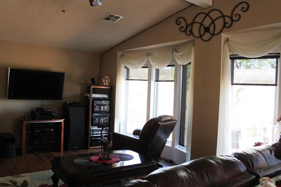 6110 Hubbard Road Acton, CA 93510 - Photo 35 of 46 a living room with furniture a window and a flat screen tv