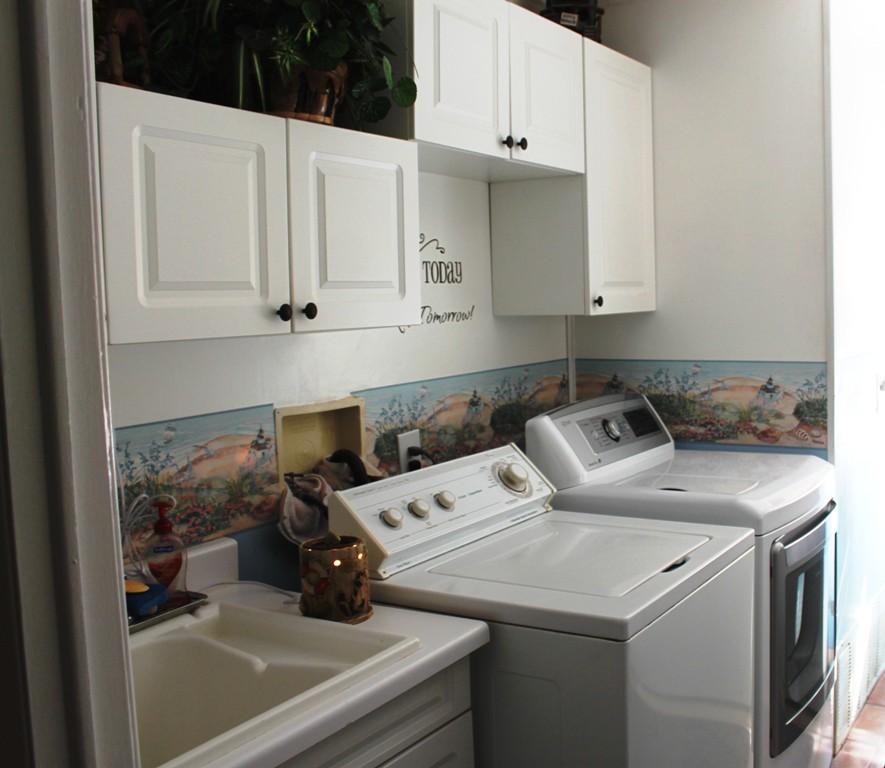 6110 Hubbard Road Acton, CA 93510 - Photo 39 of 46 a kitchen with a sink dishwasher and cabinets