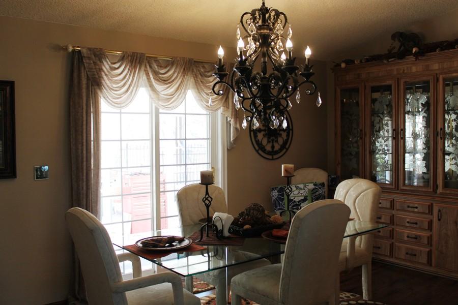 6110 Hubbard Road Acton, CA 93510 - Photo 42 of 46 a living room with furniture a chandelier and a window