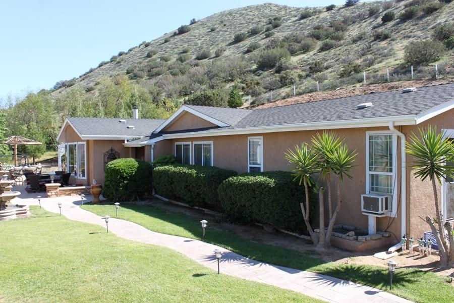 6110 Hubbard Road Acton, CA 93510 - Photo 5 of 46 a front view of a house with garden