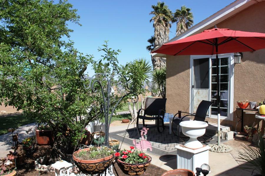 6110 Hubbard Road Acton, CA 93510 - Photo 10 of 46 a patio with tables and chairs