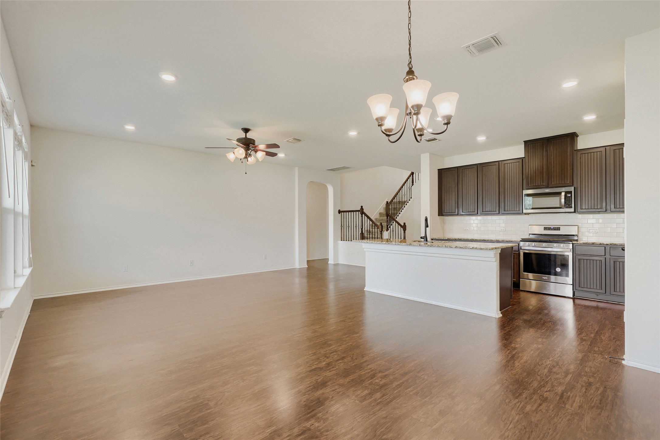 104 Kavanaugh Street Georgetown, TX 78628 - Photo 5 of 30 Kitchen open to the dining area and living room