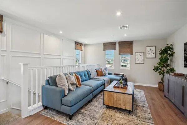 a living room with furniture and a couch