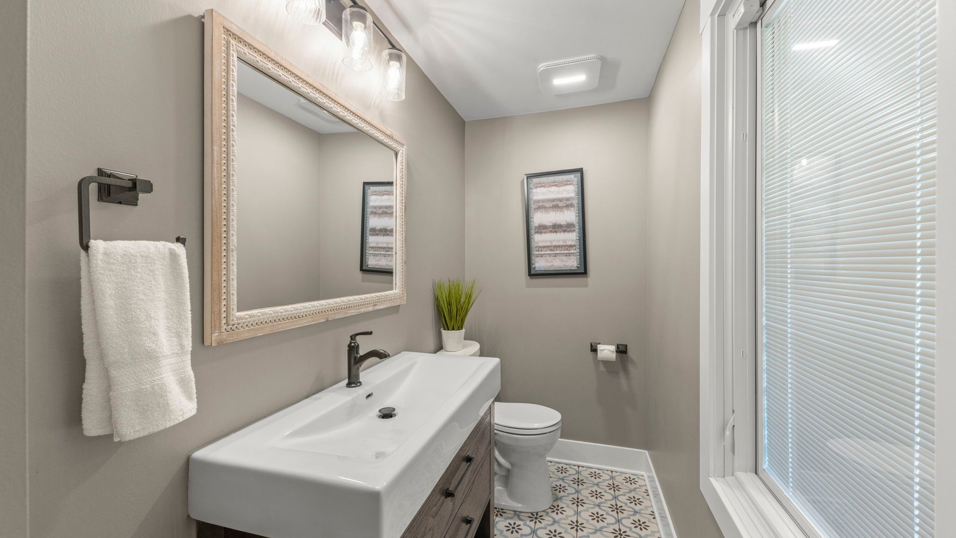 3614 Wolf Road Oswego, IL 60543 - Photo 24 of 56 a bathroom with a sink toilet and shower