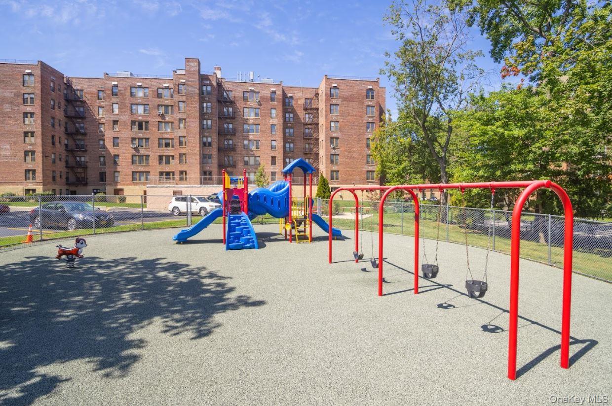 18-75 Corporal Kennedy Street, Unit 3J Queens, NY 11360 - Photo 20 of 27 a view of swimming pool with a terrace