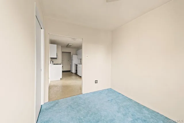 a view of a room with a hallway