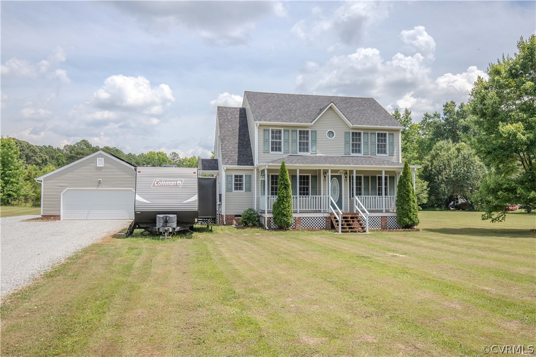 15895 Loving Union Road Disputanta, VA 23842 - Photo 2 of 42 a view of a house with patio and a yard