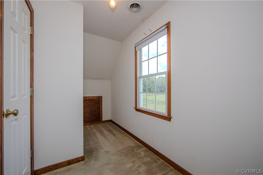 15895 Loving Union Road Disputanta, VA 23842 - Photo 22 of 42 a view of an empty room with a window