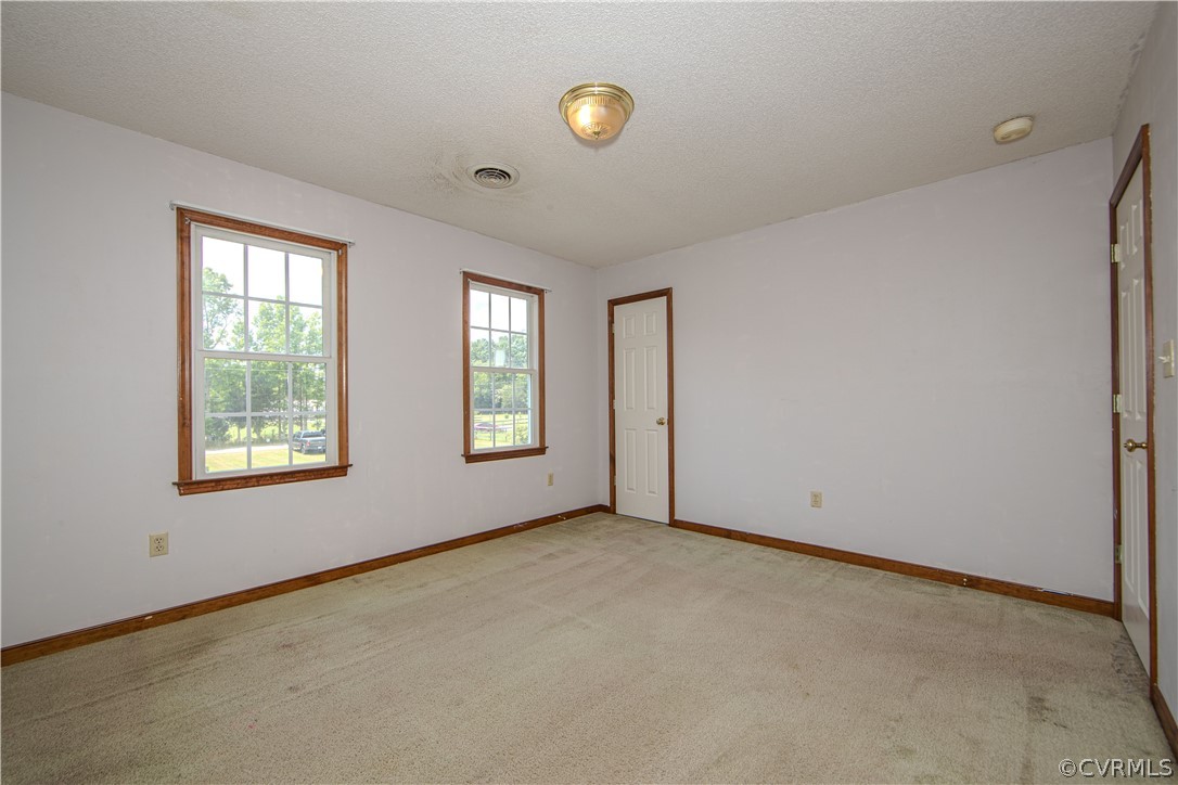 15895 Loving Union Road Disputanta, VA 23842 - Photo 25 of 42 a view of a room with windows