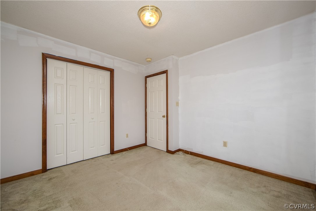 15895 Loving Union Road Disputanta, VA 23842 - Photo 27 of 42 an empty room with a window