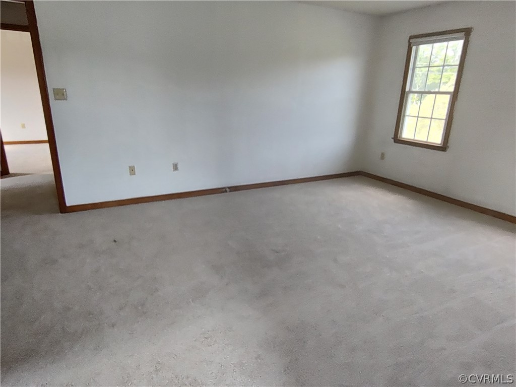 15895 Loving Union Road Disputanta, VA 23842 - Photo 35 of 42 an empty room with windows