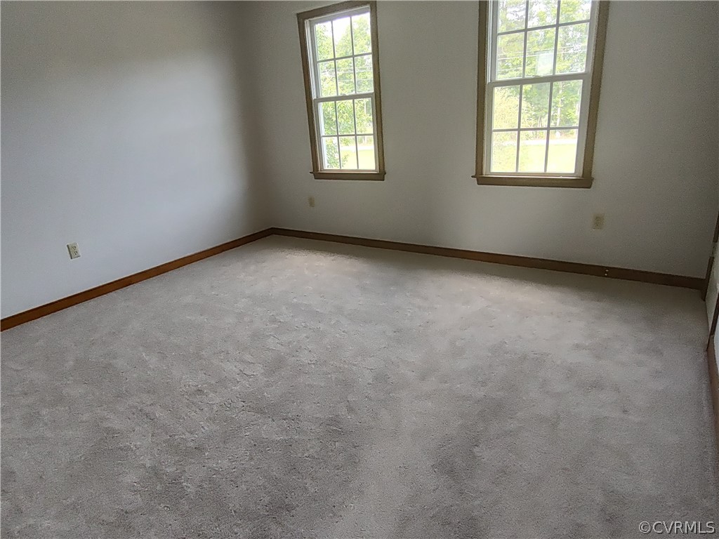 15895 Loving Union Road Disputanta, VA 23842 - Photo 38 of 42 an empty room with windows