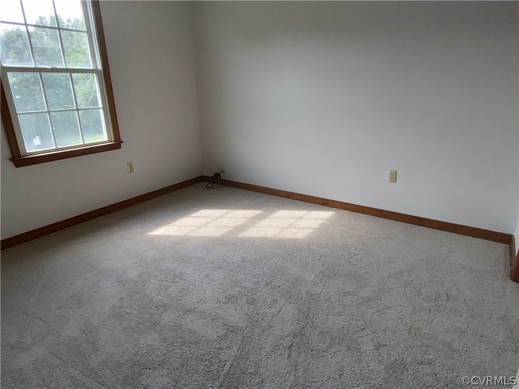 15895 Loving Union Road Disputanta, VA 23842 - Photo 39 of 42 an empty room with a window